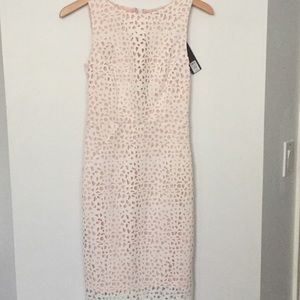 White laser cut pencil dress